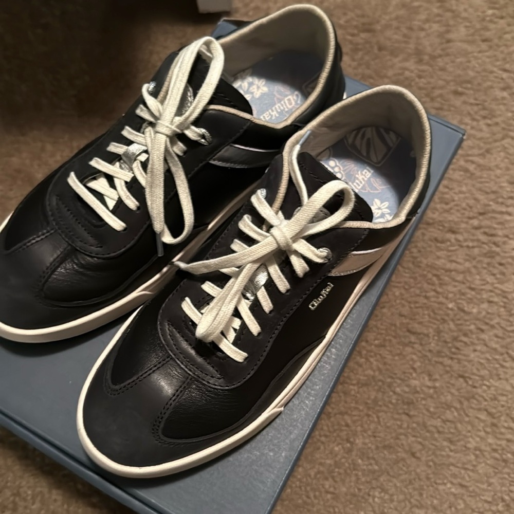 Casual Black and Silver Olukai women’s Sneakers